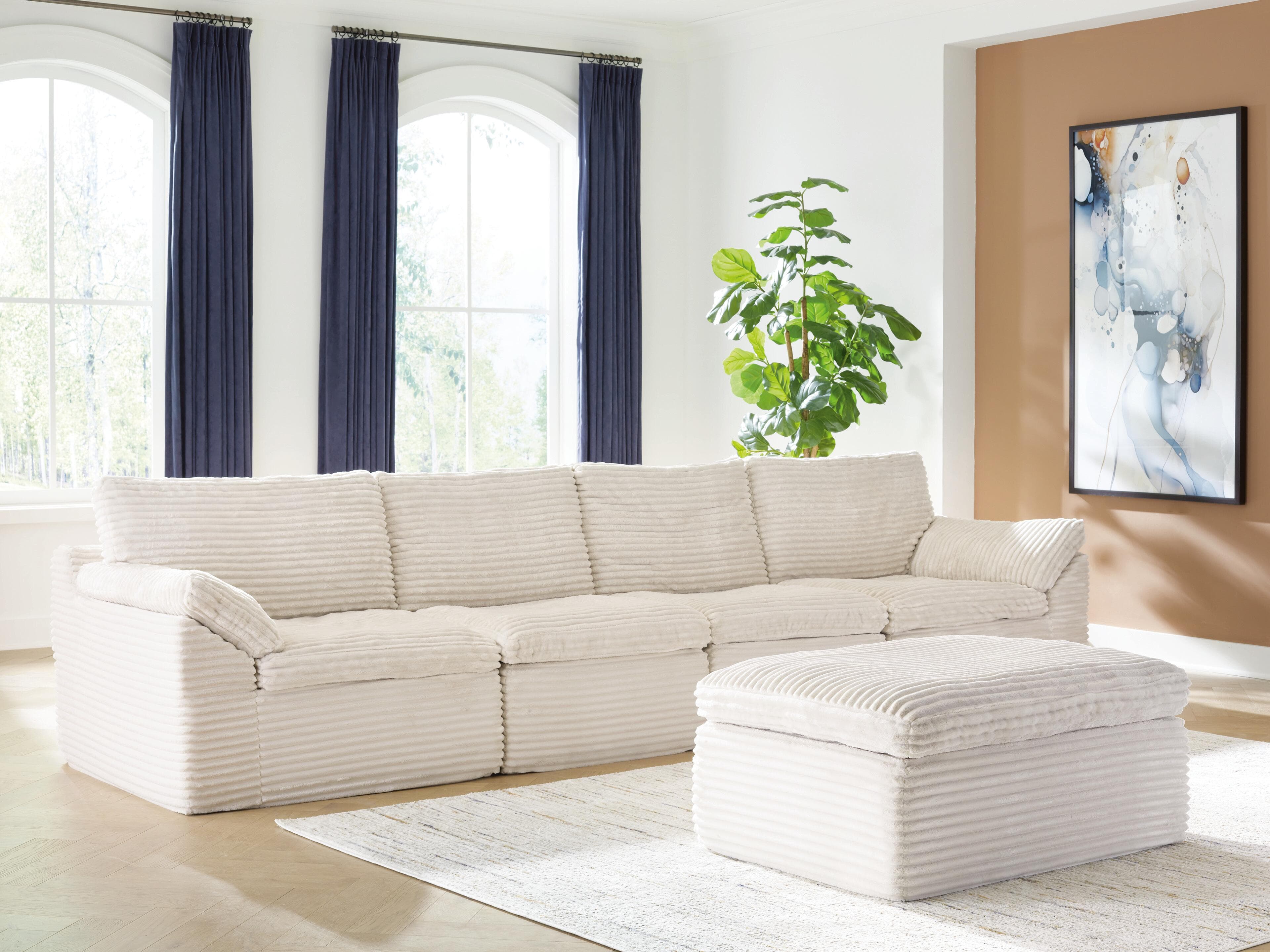 Canefield 4-Piece Sectional with Ottoman — Ivory — view 6