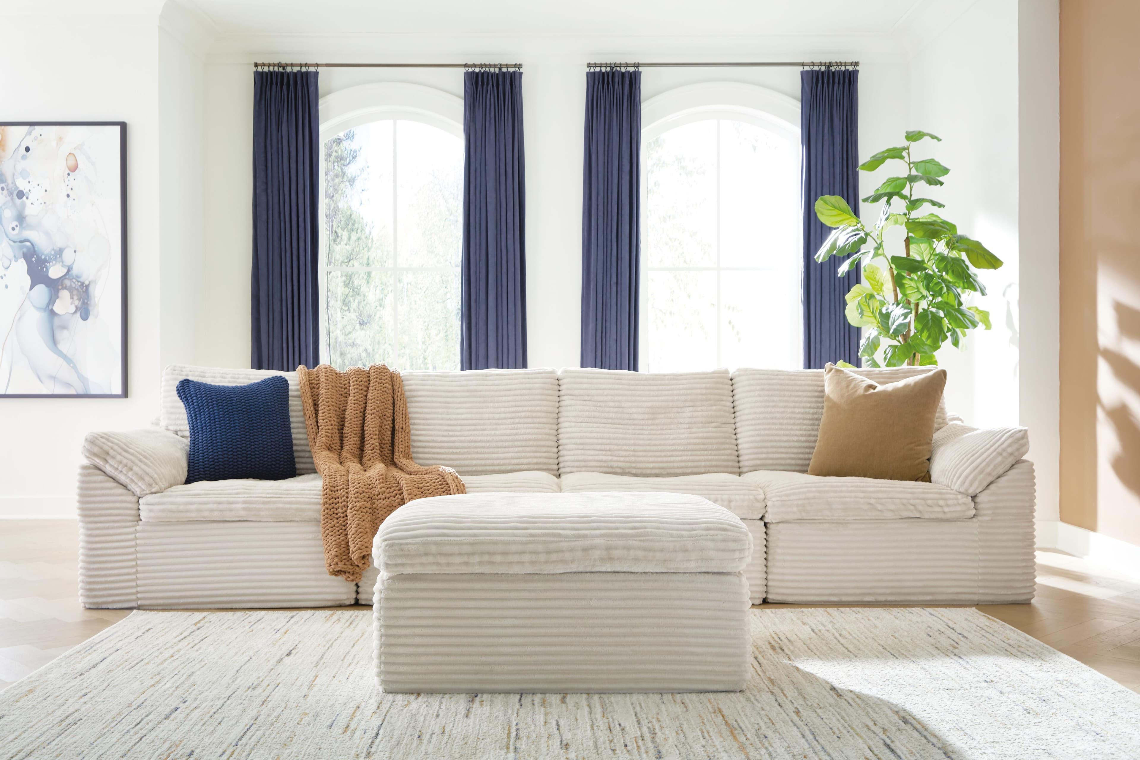 Canefield 4-Piece Sectional with Ottoman — Ivory — view 3