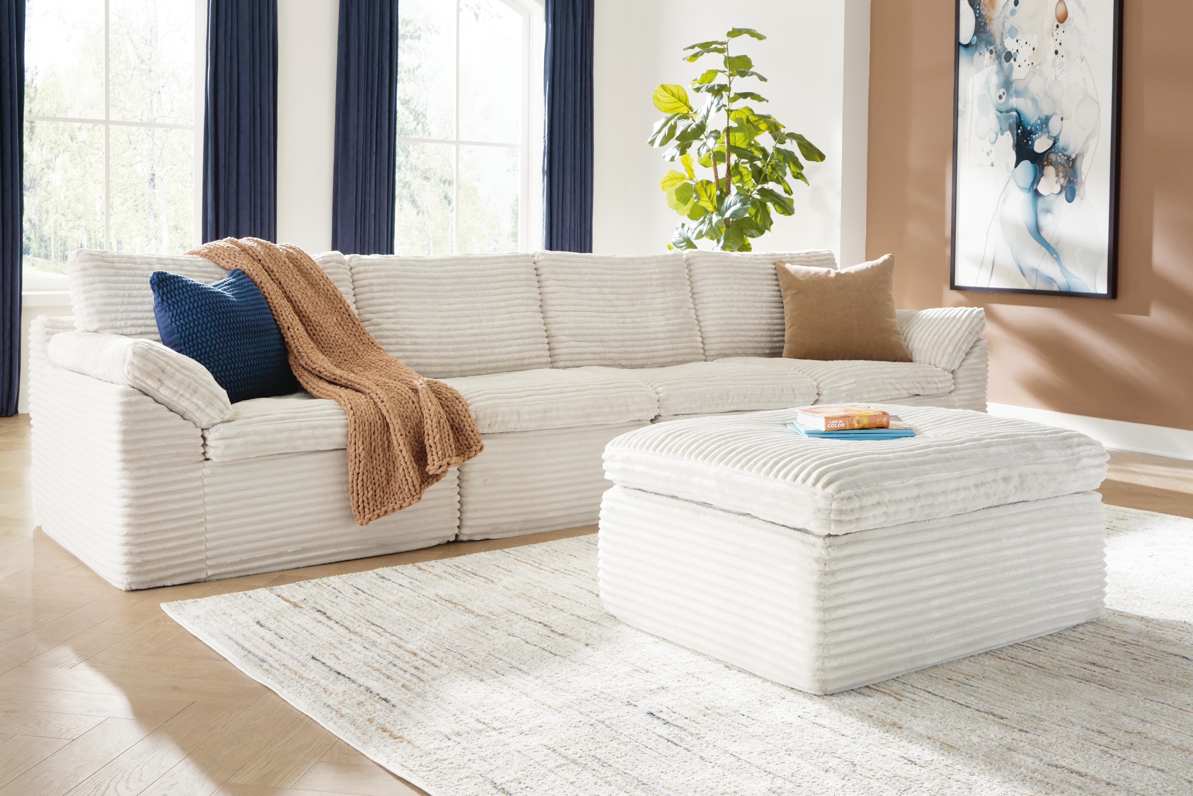 Canefield 4-Piece Sectional with Ottoman — Ivory — view 5