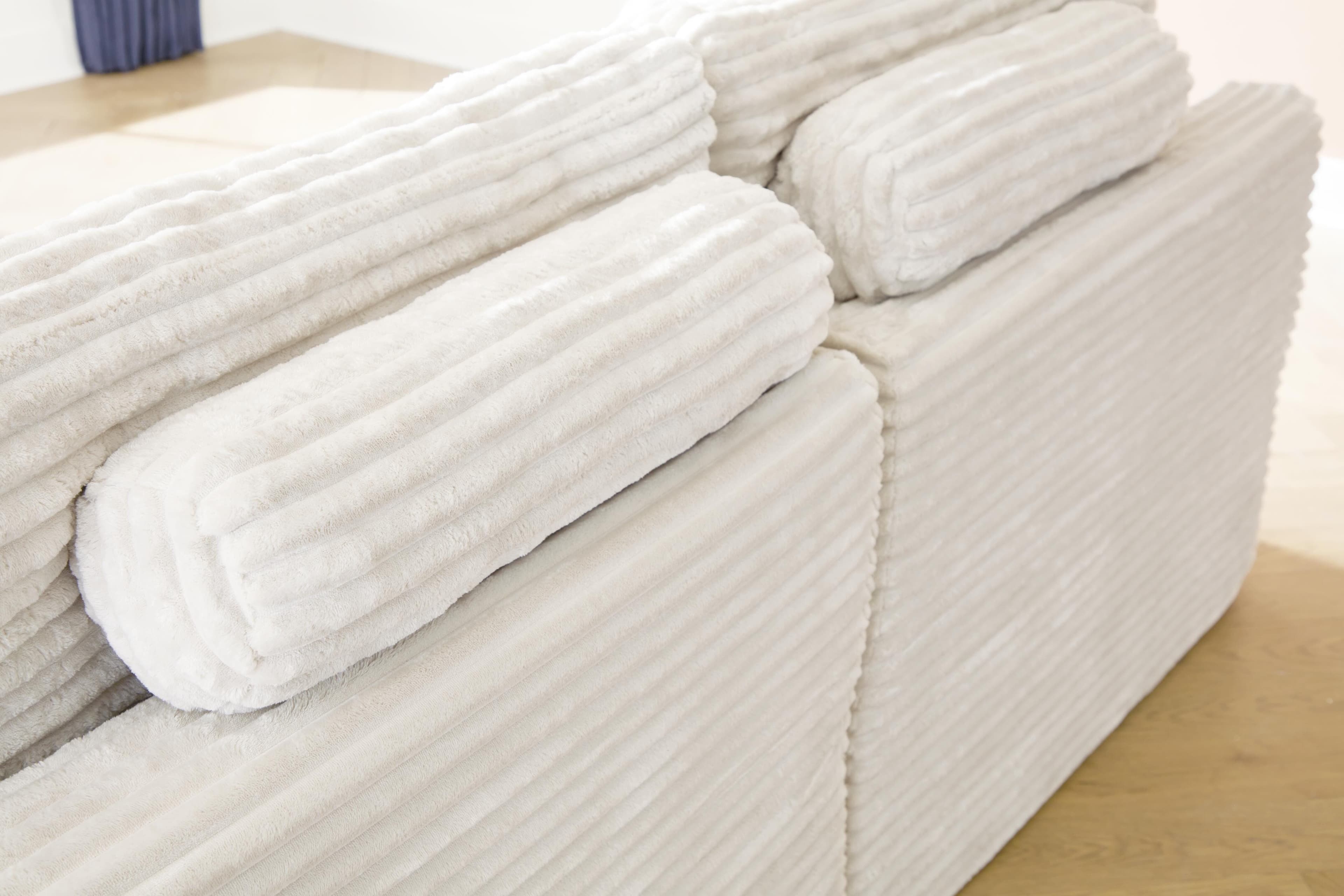 Canefield 4-Piece Sectional with Ottoman — Ivory — view 7