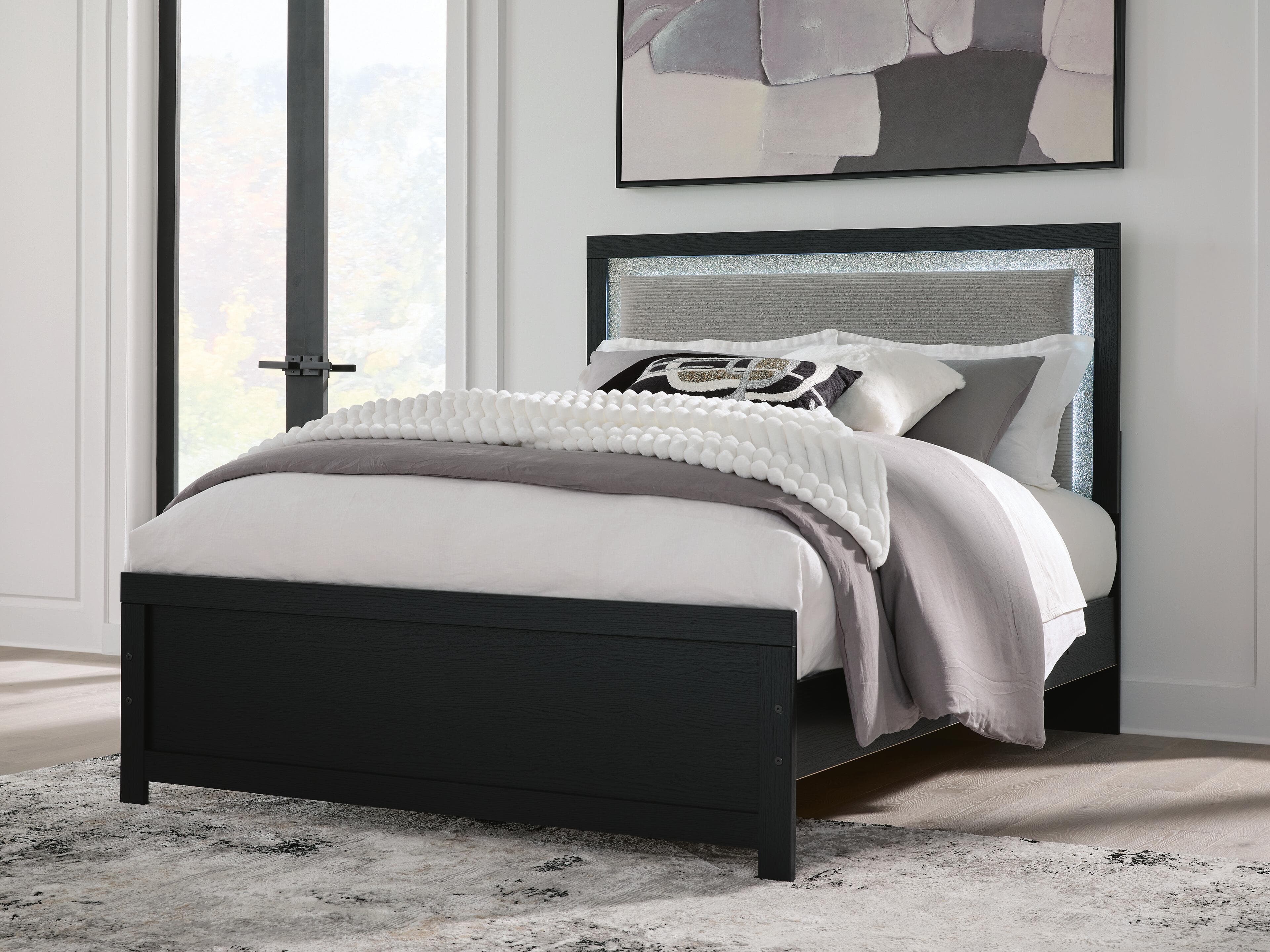 Raechalla Queen Upholstered Panel Bed — Black — view 2