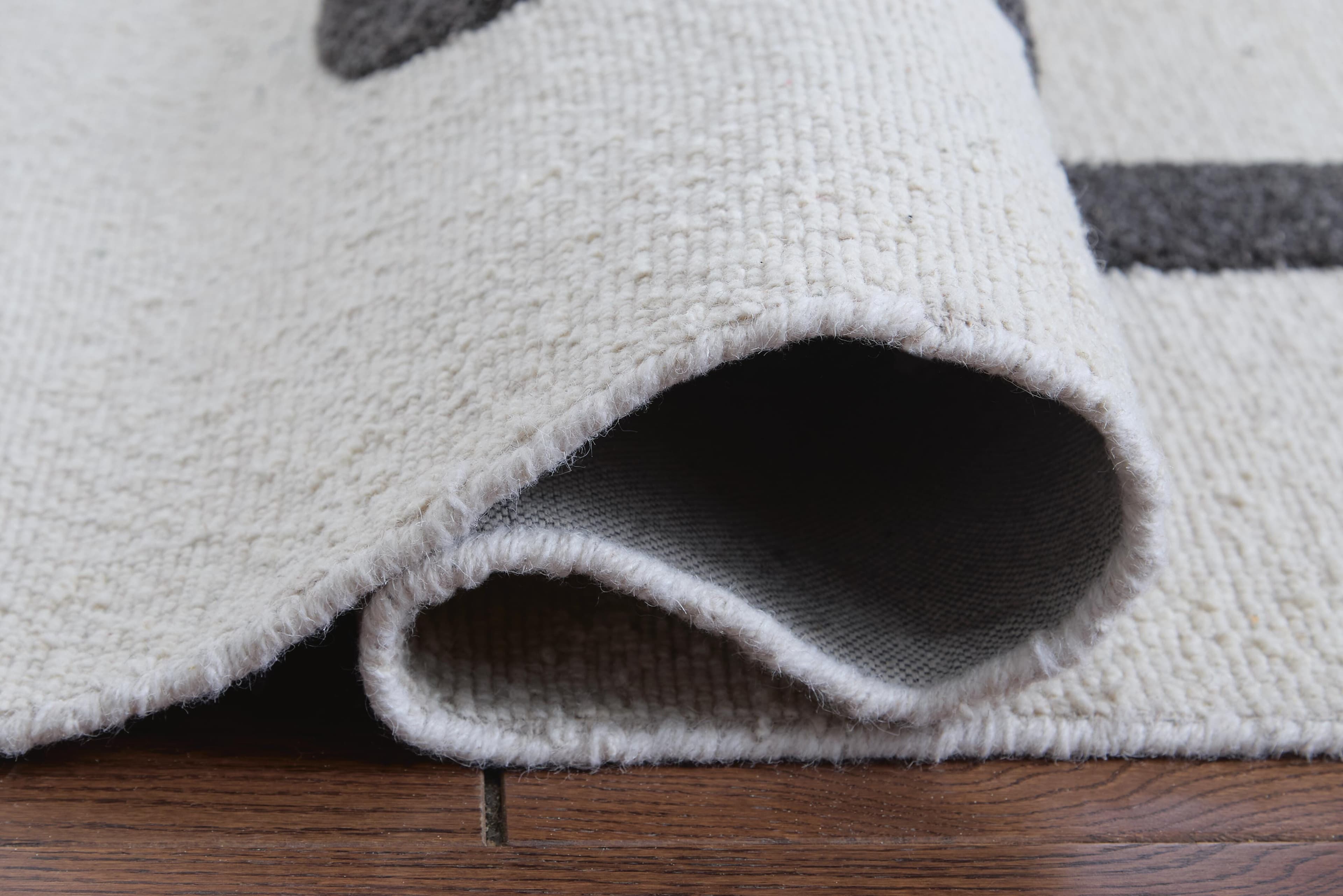 Davismour 5' x 7' Area Rug — Ivory/Taupe/Charcoal — view 4